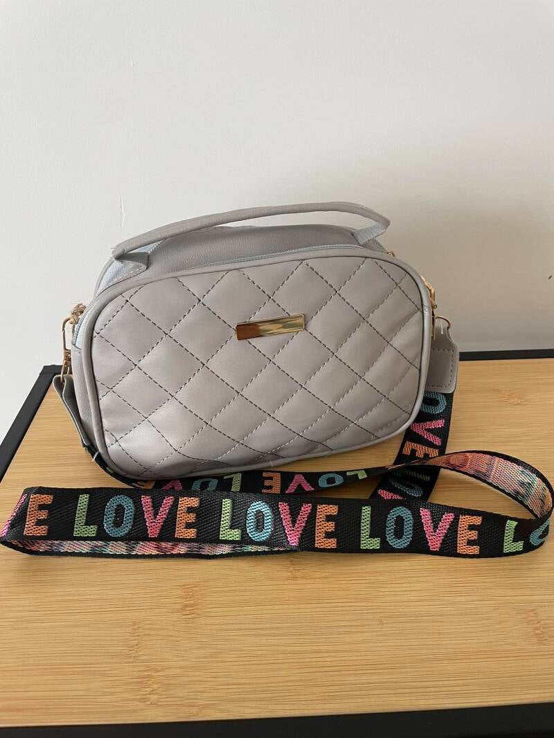 Compact tasje met love lint